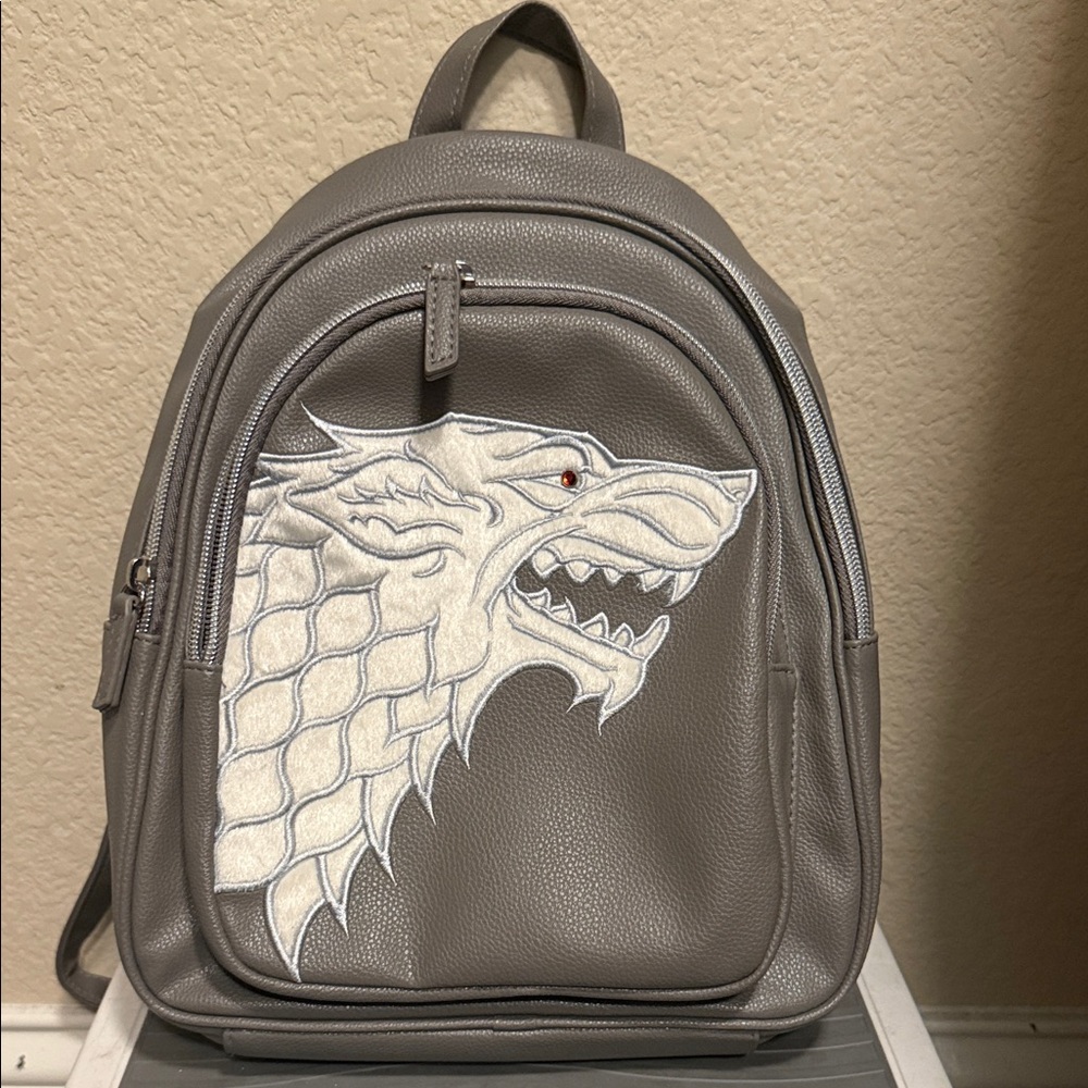Danielle Nicole Gray Backpack with White Dragon Design